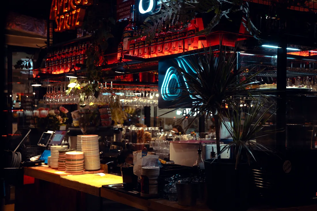 Dimly lit bar with vintage lamps