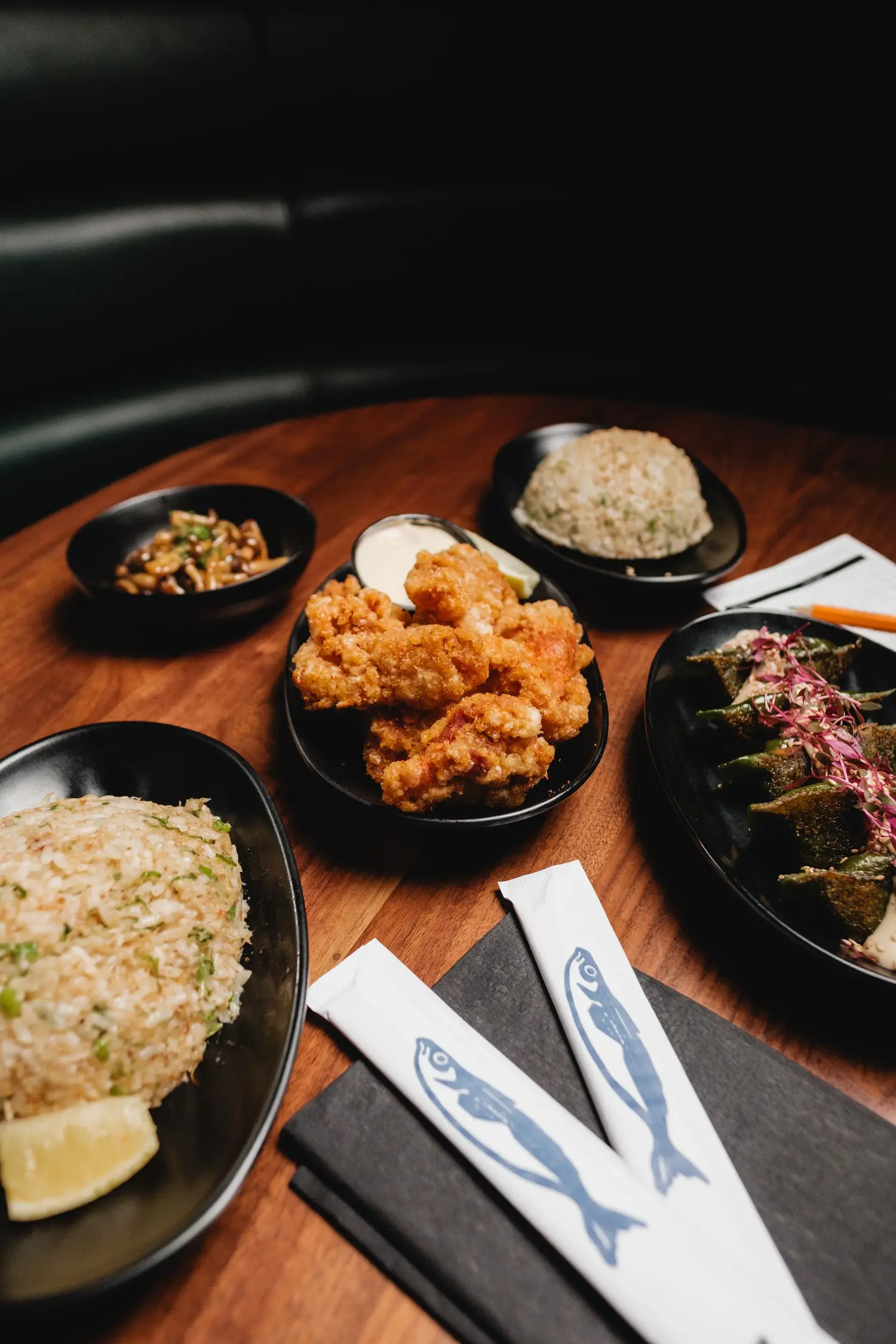 Fried rice, karaage and dumplings on a restaurant table